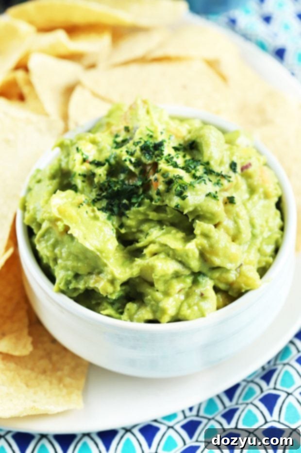 Serving of Tropical Guacamole with chips