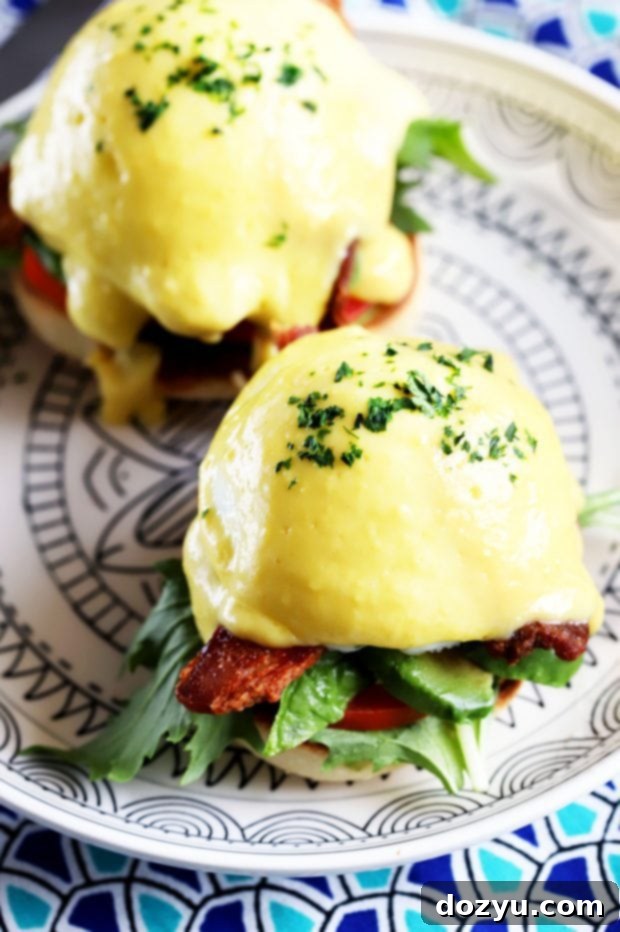 Three BLAT Eggs Benedict servings, showcasing vibrant ingredients and creamy hollandaise sauce.