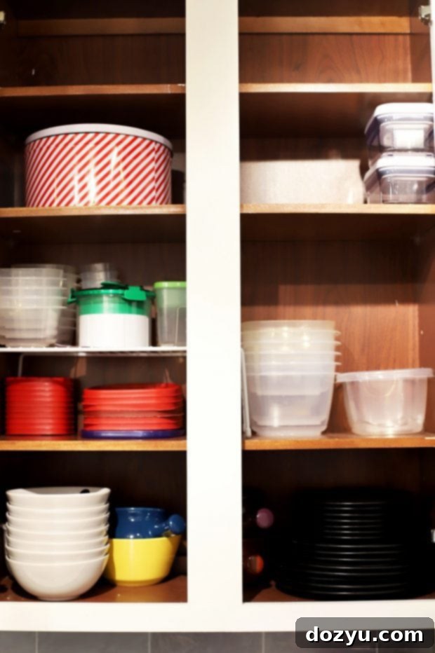 Open kitchen drawer with neatly arranged knives and tools