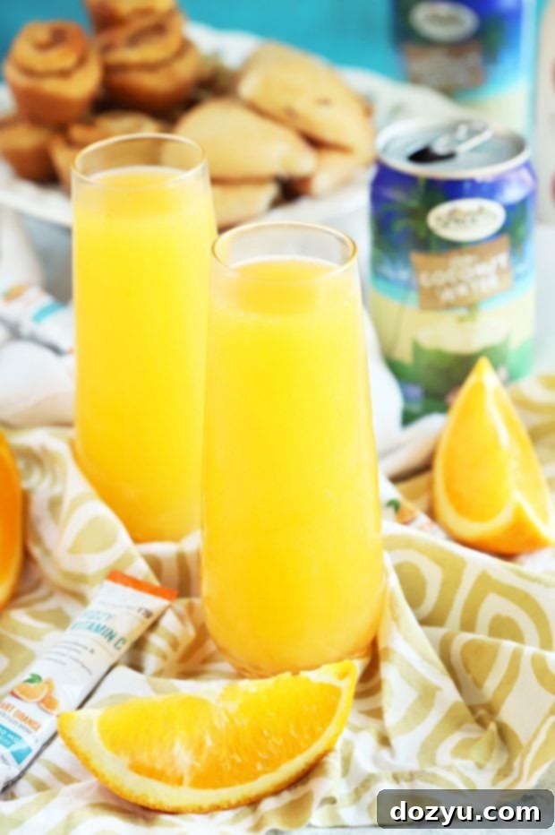 Close up of the Tropical Mimosa Mocktail showing its bubbly texture