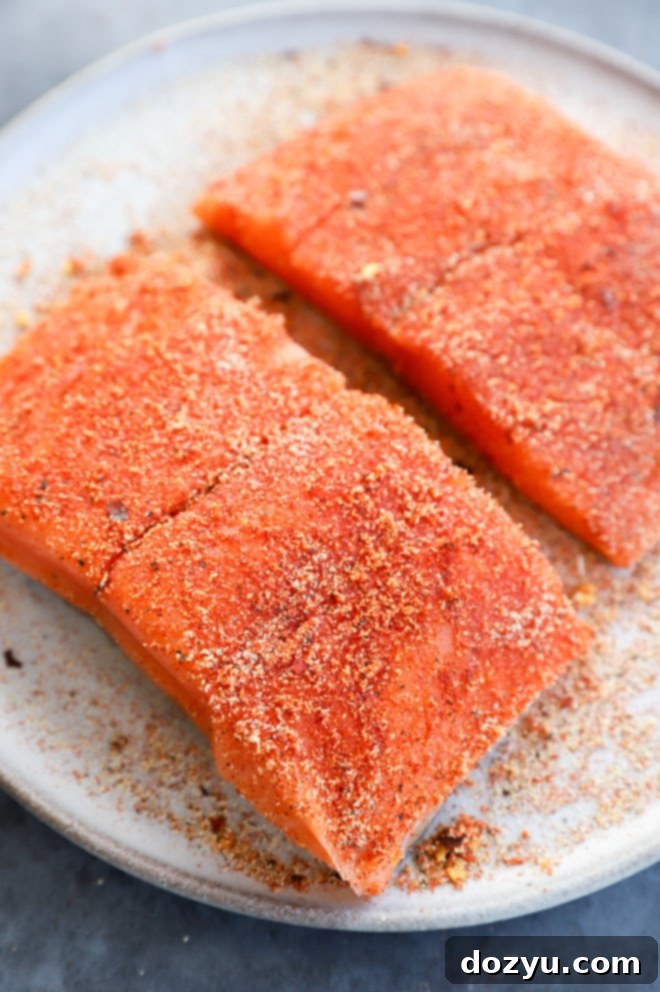 Image of salmon fillets rubbed with spice mixture