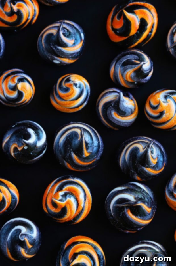 Spooky Halloween Meringue Swirls, vibrant orange and black colors