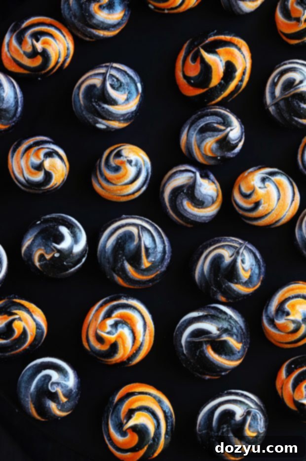 Close-up of meringue swirls with a spoon