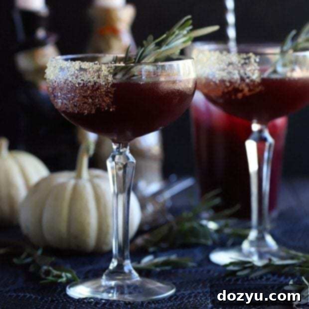 Square cropped thumbnail image of Spooky Pomegranate Mezcal Cocktail