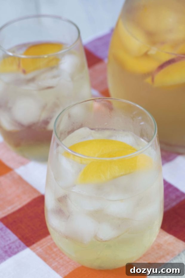 Homemade Peach Sangria served in a glass