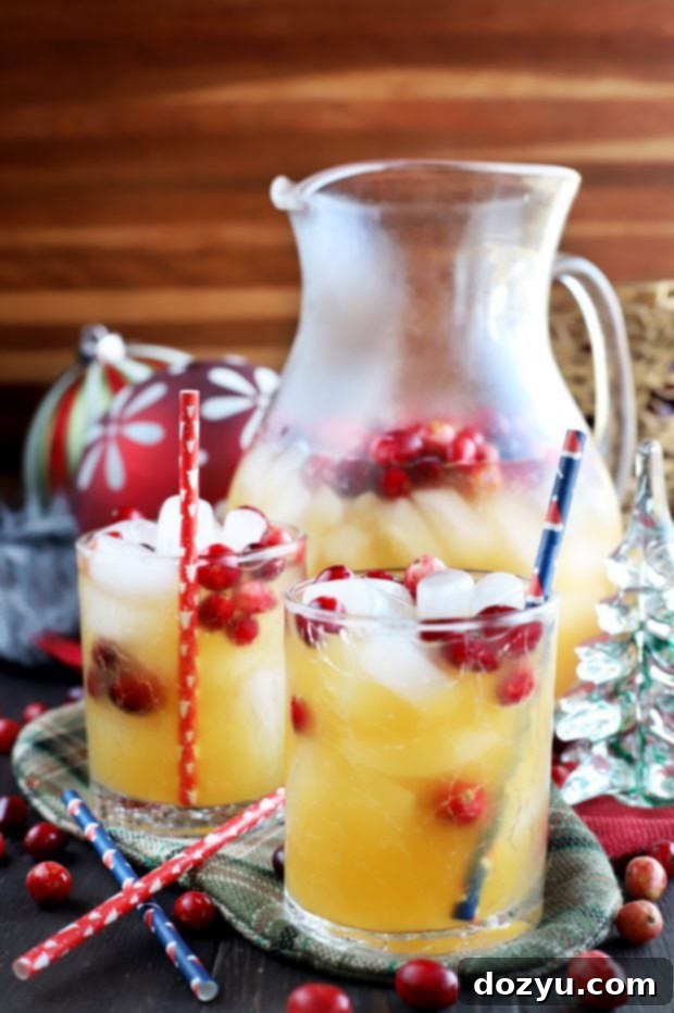 Spiced Tropical Holiday Champagne Punch ready to serve