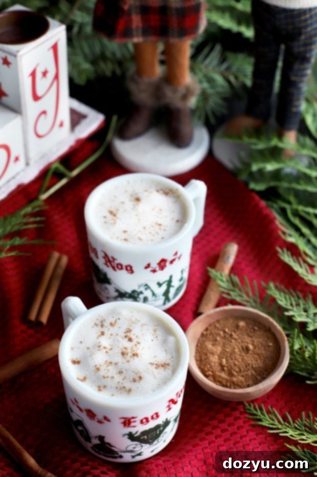 Mugs of The Best Homemade Eggnog decorated for the holidays