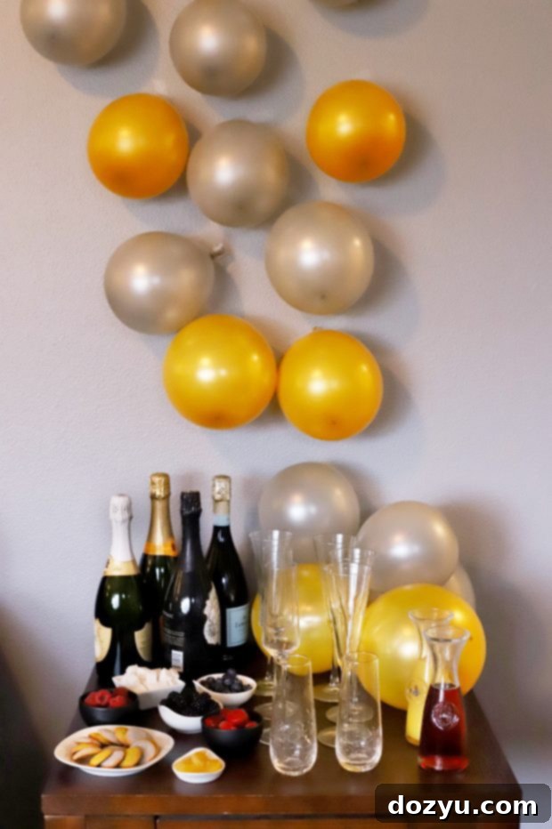 New Year's Eve party decorations with festive balloons and drinks
