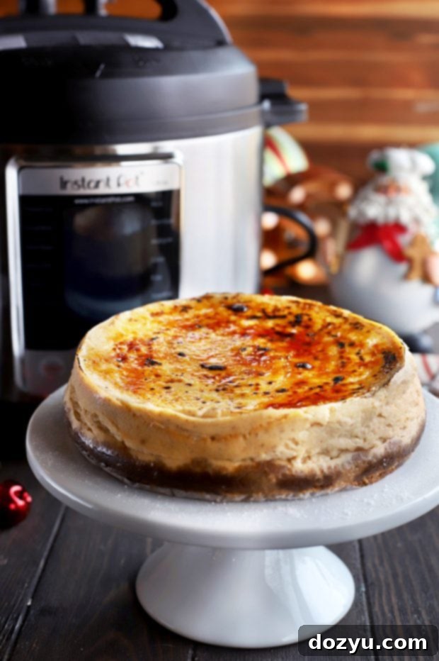 Brûléed Instant Pot Eggnog Cheesecake with a cozy holiday background