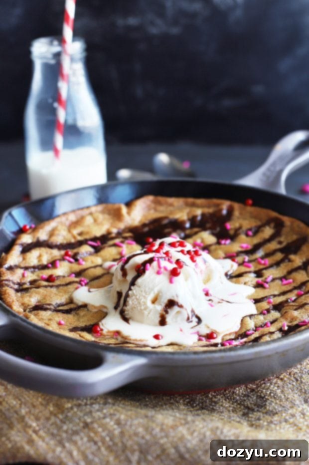 Cozy Pizookie Skillet For Two 3 Close-up of a Pizookie Skillet with melted chocolate and M&Ms