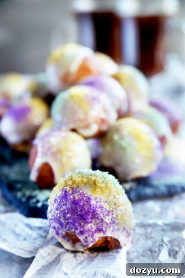 Cinnamon-spiced King Cake Donut Holes with icing