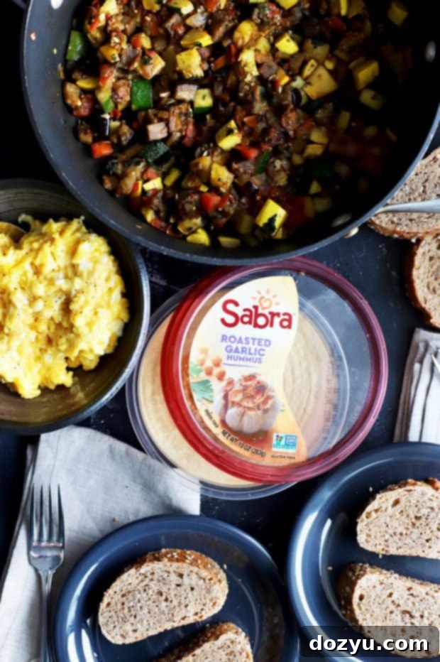 Ratatouille Hummus Toast with Soft Scrambled Eggs