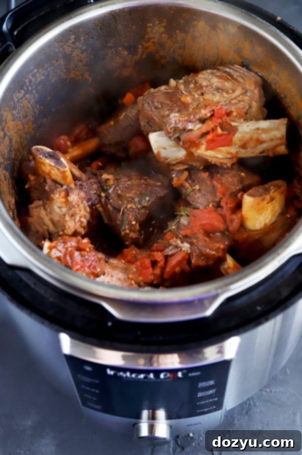 Instant Pot Fall-Off-The-Bone Short Rib Osso Buco 5 A serving of Instant Pot Short Rib Osso Buco with sauce and gremolata