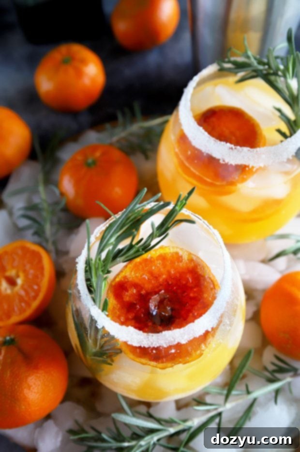 Close-up of a Clementine Mezcal Margarita glass with sugar rim
