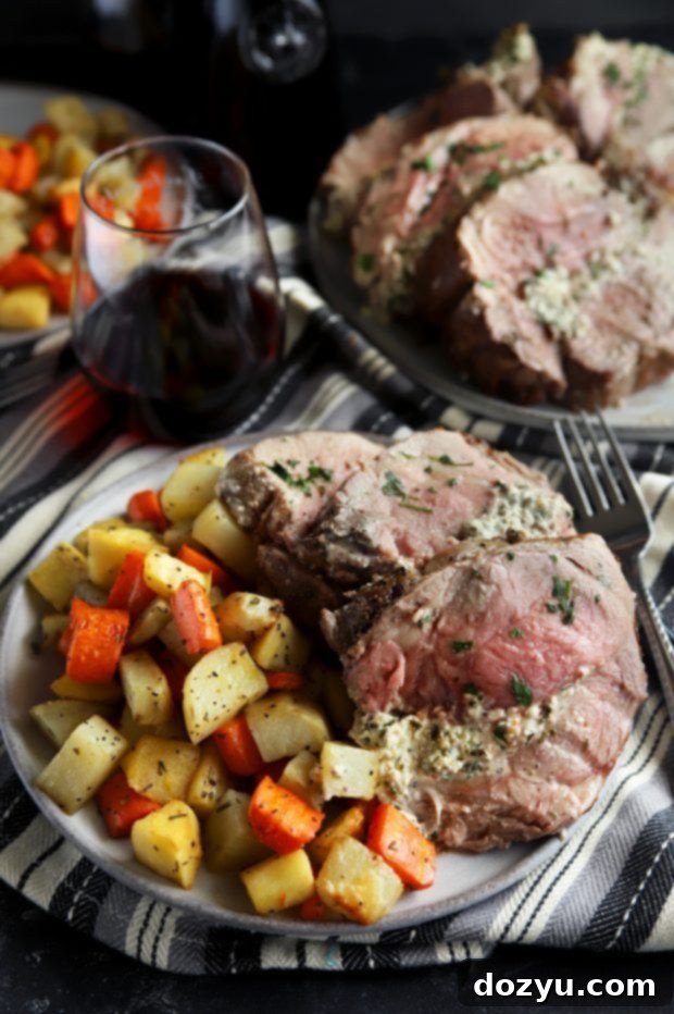 Leg of Lamb Stuffed with Herbed Goat Cheese 6 Sliced stuffed leg of lamb with vegetables and wine