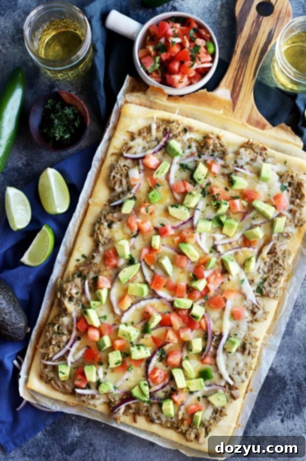 Avocado Pulled Pork Flatbread with Grilled Tomatillo Salsa, an easy and spicy homemade pizza alternative.