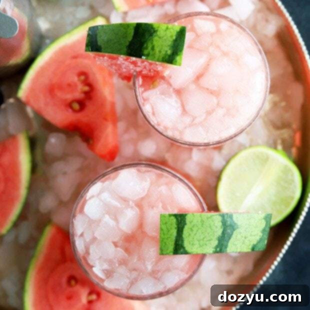 Salted Watermelon Grapefruit Paloma, a vibrant summer cocktail with tequila, watermelon, and grapefruit.