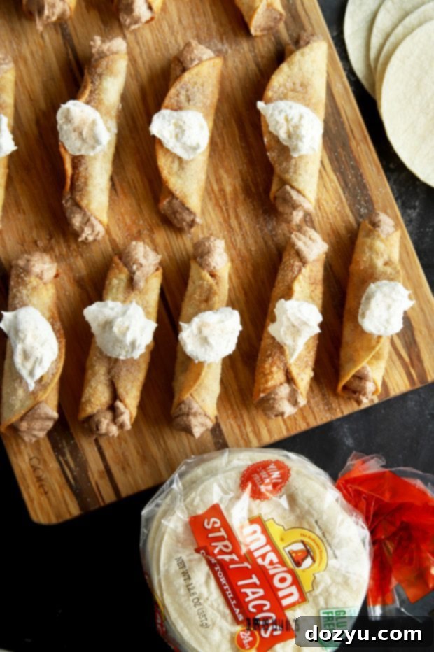 Crispy Churro Cheesecake Taquitos ready to be served at a festive party.