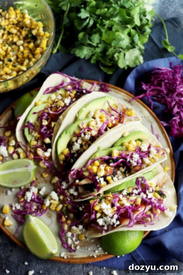 Charred Corn Chicken Avocado Tacos ready to eat