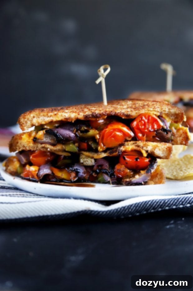 A balsamic grilled vegetables grilled cheese on a plate