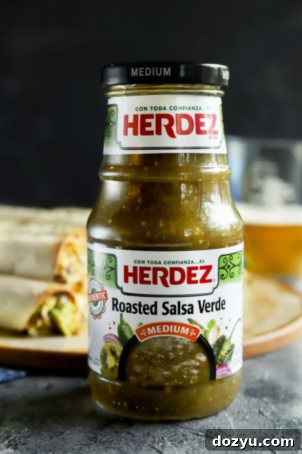 A bottle of HERDEZ Roasted Salsa Verde, showcasing the key ingredient for authentic Mexican dishes