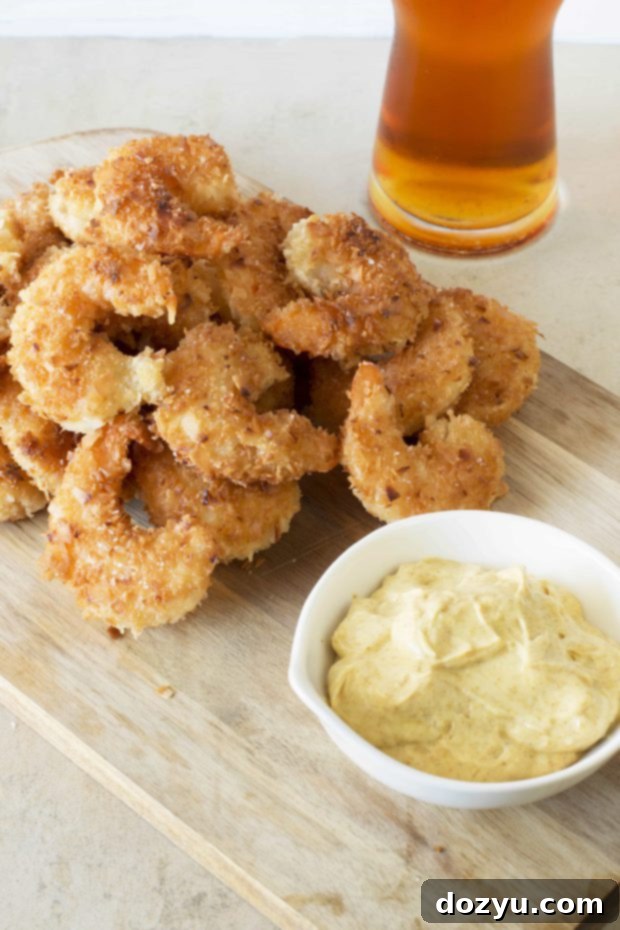 Coconut Shrimp with Spicy Curry Dip, a perfect appetizer.
