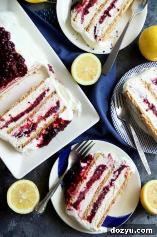 Slices of frozen Blackberry Lemon Icebox Cake, showcasing layers
