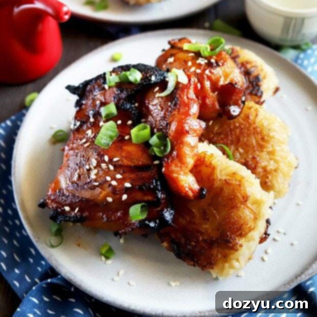 Spicy Korean chicken thighs thumbnail image with crispy ginger rice