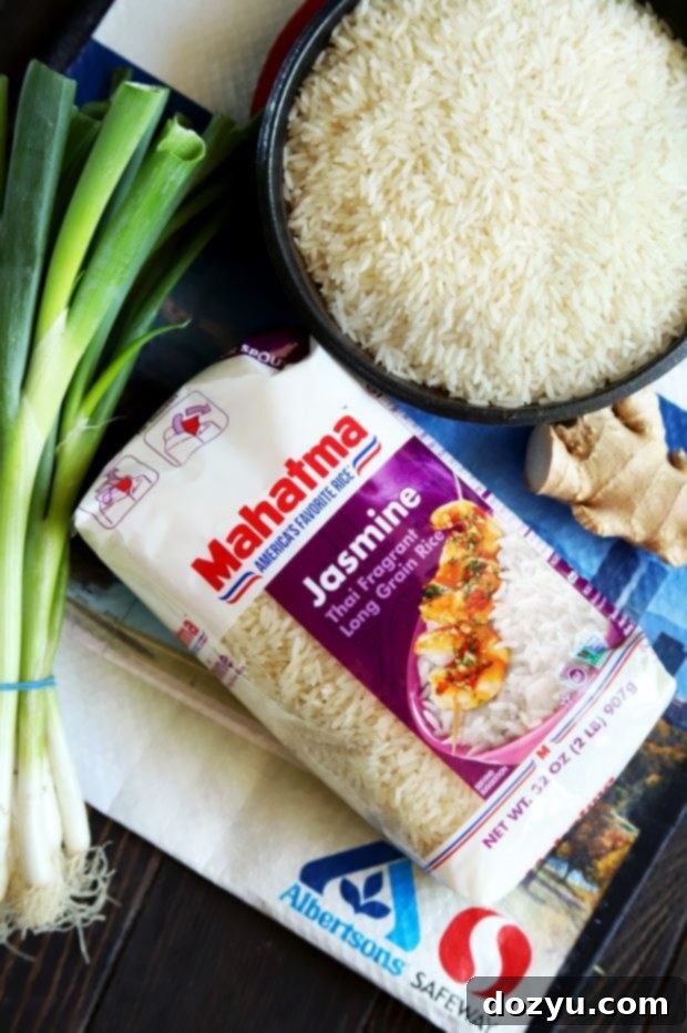 Fresh ingredients for the recipe: Mahatma® Jasmine Rice, green onions, and fresh ginger from Safeway