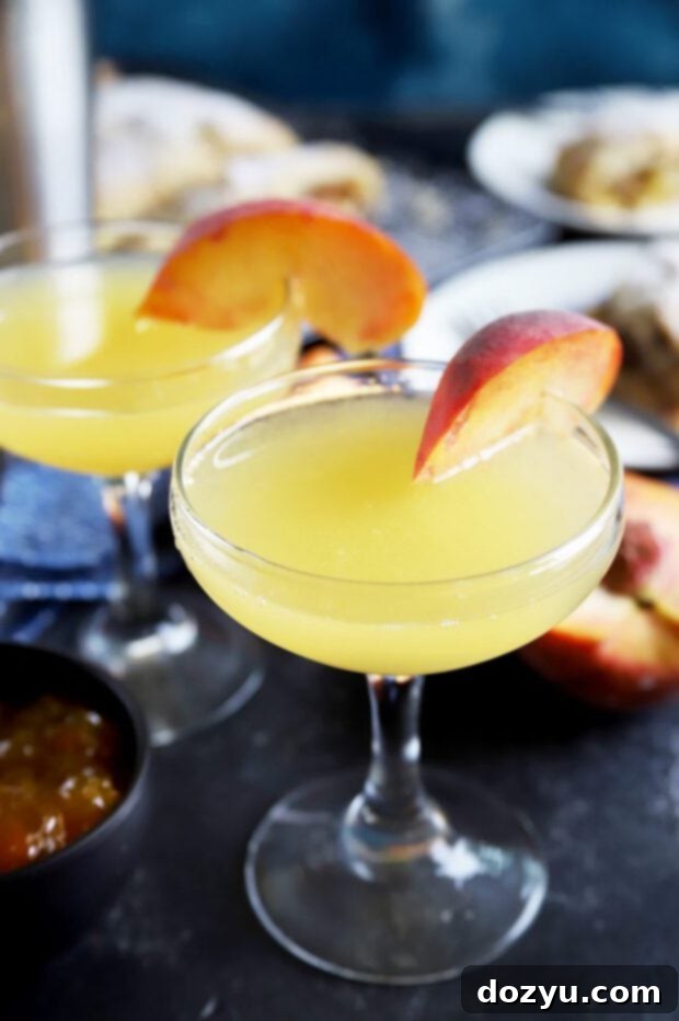 Peach breakfast martini with peach slices