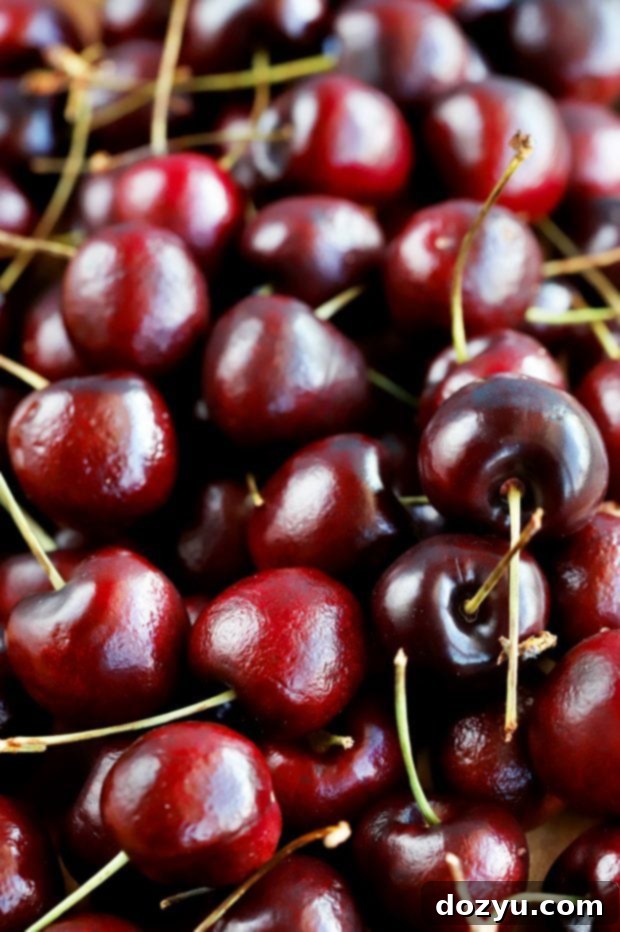 Homemade brandy-soaked cherries with rum, a delicious way to preserve seasonal fruit.
