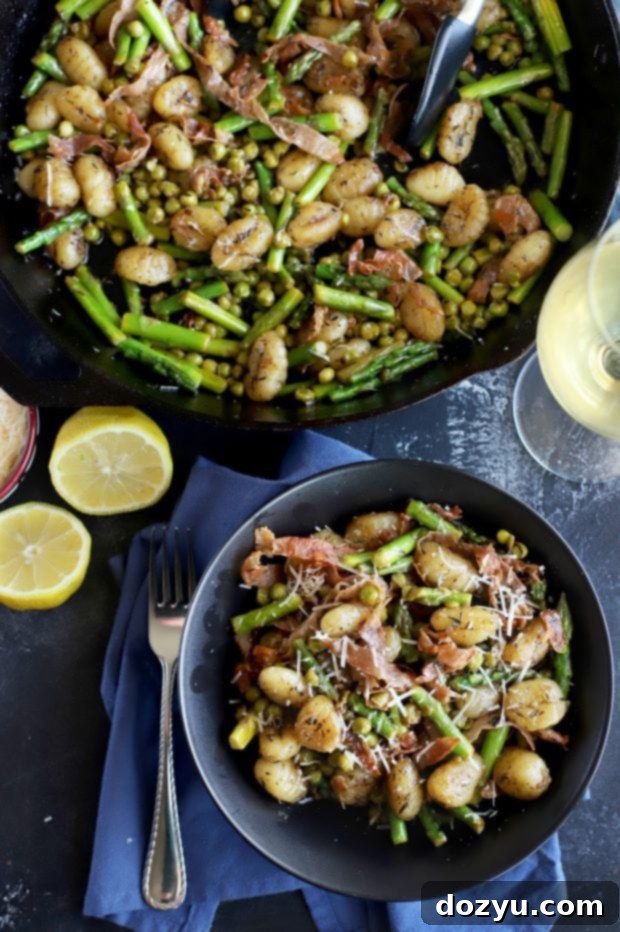 A delectable dinner of brown butter gnocchi with fresh asparagus and peas, highlighting spring produce.
