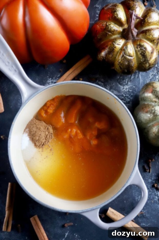 Cozy Pumpkin Spice Syrup 7 Making simple syrup with pumpkin, spices, and sugar