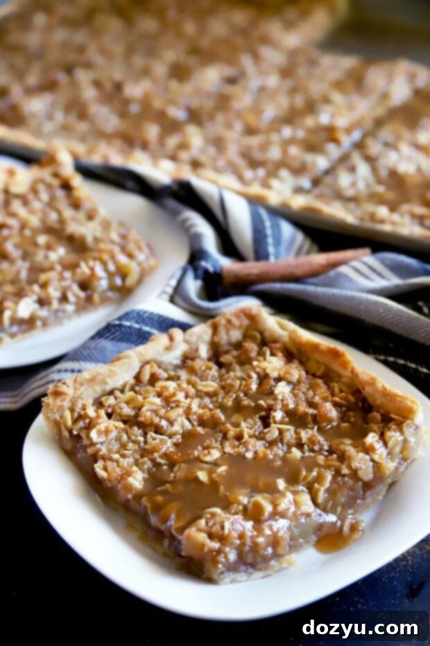 Slice of pie on a plate with caramel sauce