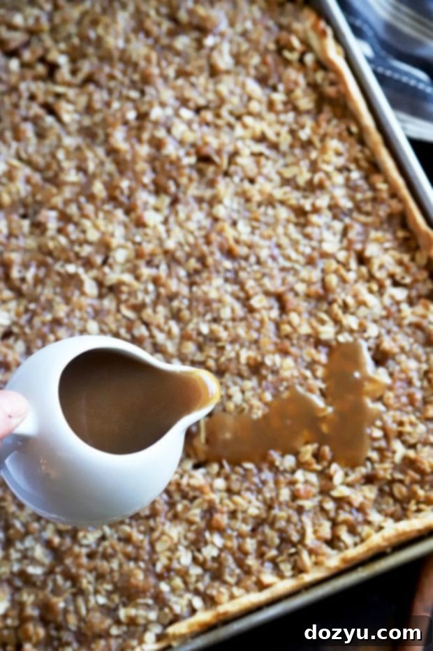 Pouring caramel sauce over slab pie