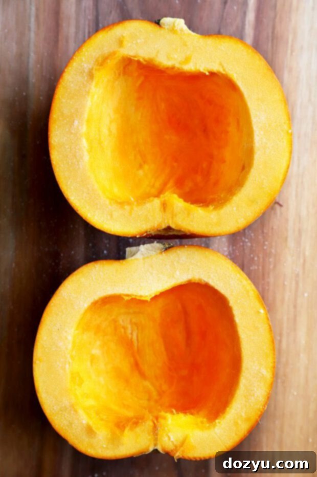 Pie pumpkin cut in half with seeds removed