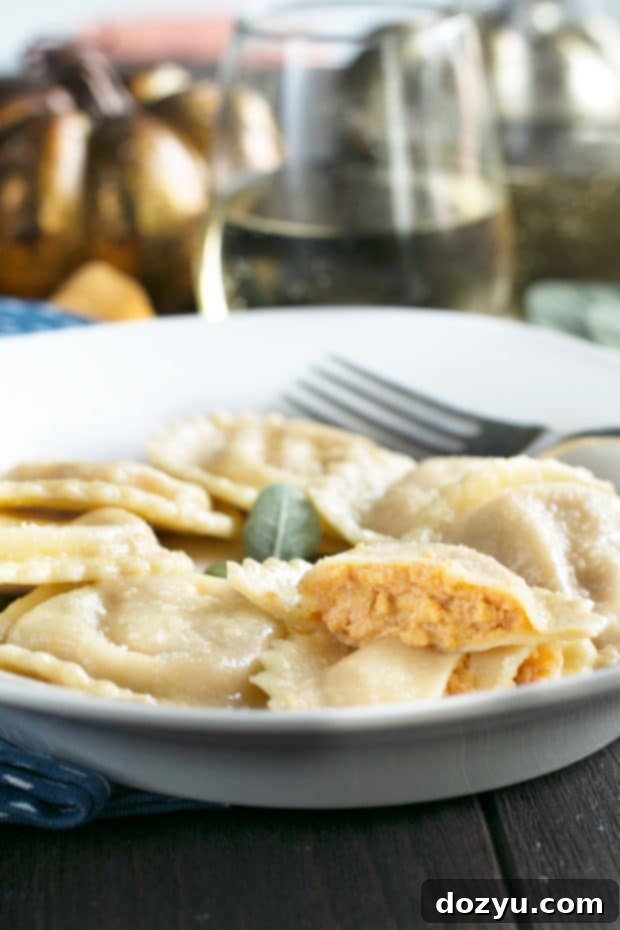 Homemade Pumpkin Ricotta Ravioli with Brown Butter Sage Sauce, a delicious savory pumpkin dish.