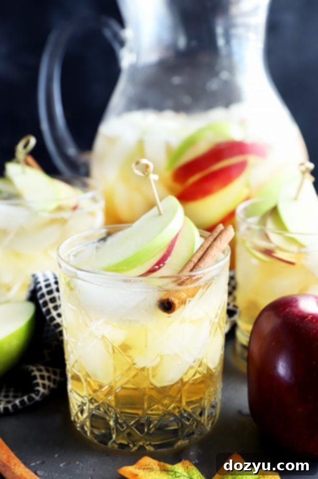 Photo of apple pie sparkling sangria in a rocks glass