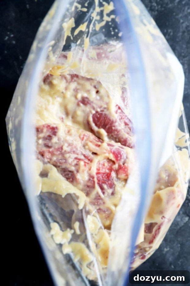 Umami Steak & Avocado Power Bowl 6 Flank steak coated in miso marinade inside a plastic bag