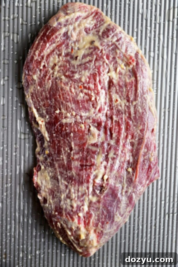 Umami Steak & Avocado Power Bowl 7 Roasted steak with miso marinade, sliced on a cutting board