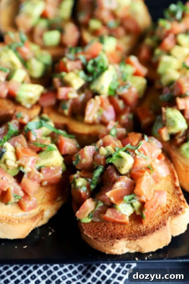 Close-up photo of avocado bruschetta on toasted bread
