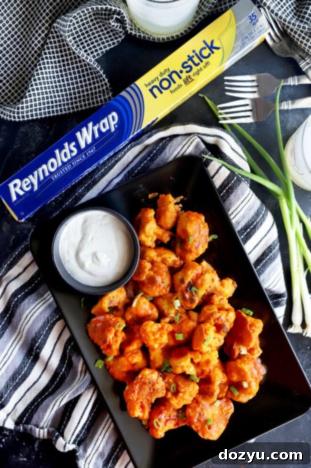 Crispy cauliflower on a platter, ready to be served as a healthy snack