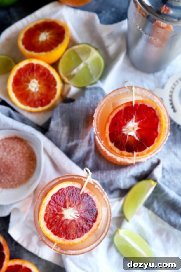 Overhead photo of orange margaritas