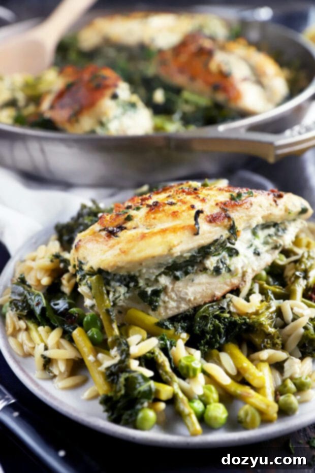 One-Pan Lemon Goat Cheese Stuffed Chicken with Spring Orzo 9 Side photo of stuffed chicken skillet