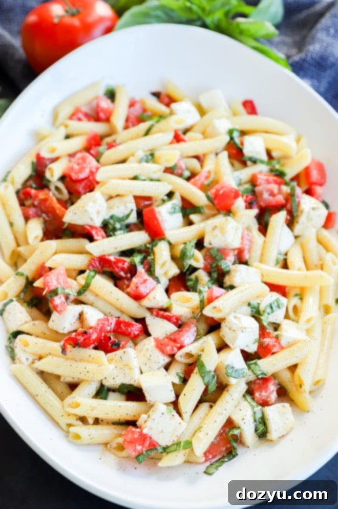 bright lemon penne side dish in large bowl for summer dinner