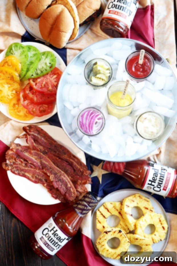 Selection of gourmet BBQ burger bar elements, including sauces and seasonings