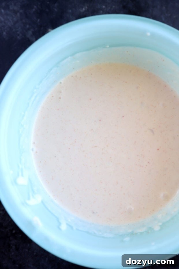 Cheesy Bacon Potato Skewers 7 Roasted garlic aioli in a bowl