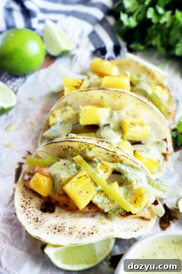 Delicious Sheet Pan Pineapple Chipotle Chicken Tacos ready to be served, showcasing vibrant colors and fresh ingredients.