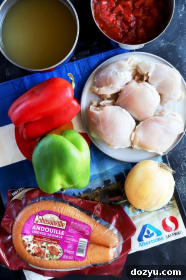 Instant Pot Louisiana Chicken Sausage Soup 5 A vibrant flat lay photo of fresh ingredients including bell peppers, onions, chicken, and Johnsonville Andouille sausage, ready for the Instant Pot Creole Soup.