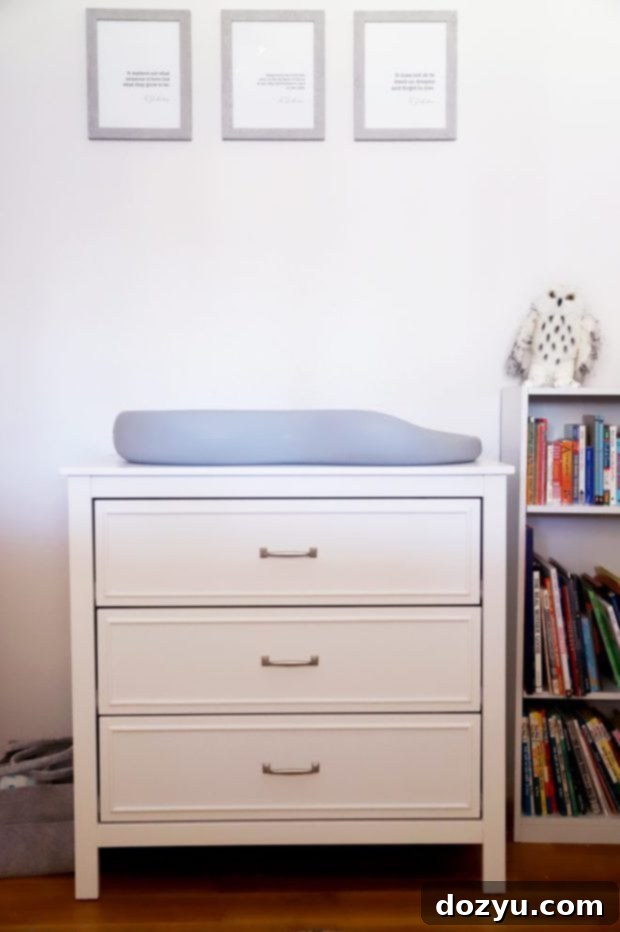 Close-up of the organized dresser drawers in the Harry Potter nursery, showing baby essentials neatly arranged.